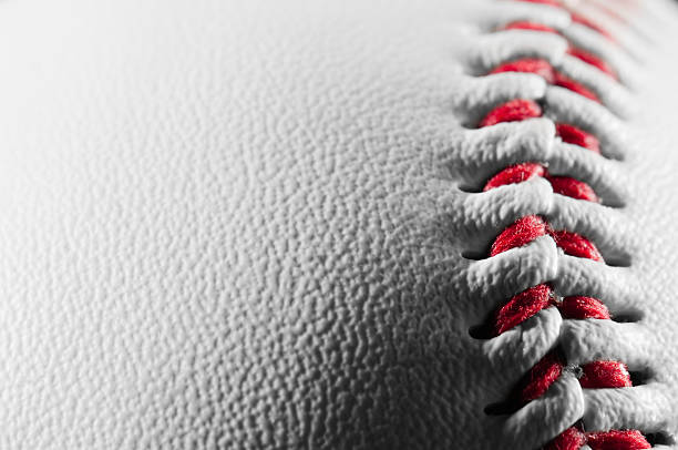istock White leather baseball with red stitching texture and detail 185070376