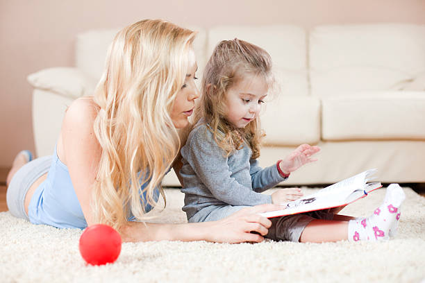 istock Mother and daughter have fun with story 185070779