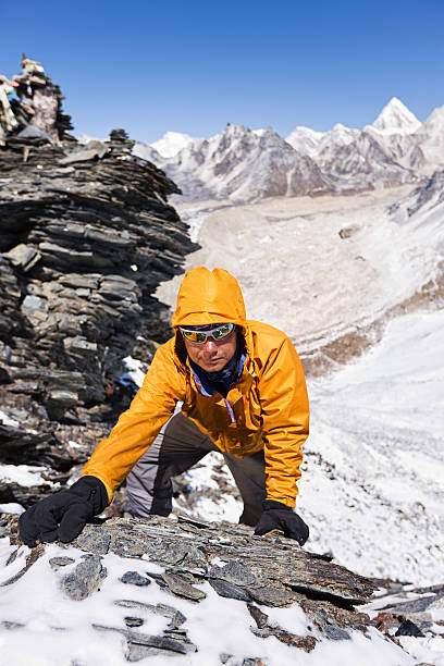 istock Nepali sherpa climbing in Himalayas 185071059