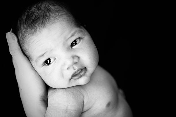 istock Newborn Baby in Mother's Hands 185071192