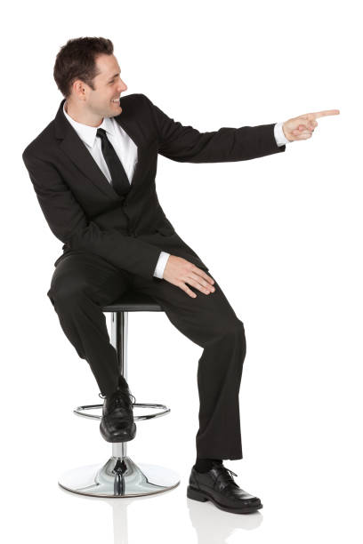 istock Businessman sitting on a chair and pointing 185071679