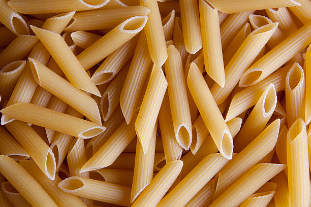 pâtes penne rigate - angio photos et images de collection