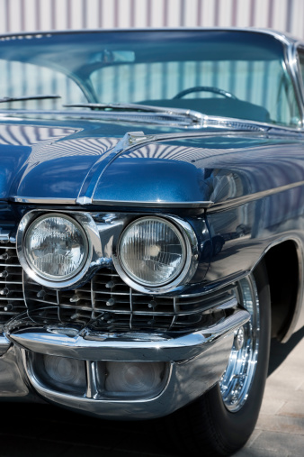 Des Moines, IA - July 02, 2022: High perspective front view of a 1974 Oldsmobile Cutlass Supreme Coupe at a local car show.