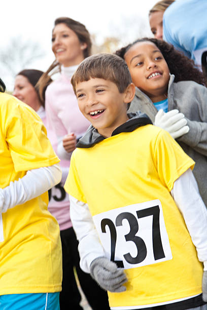 istock Happy boy walking in a charity event race 185072539