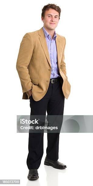 Alegre Joven De Pie Foto de stock y más banco de imágenes de Hombres - Hombres, Fondo blanco, Blazer - Chaqueta