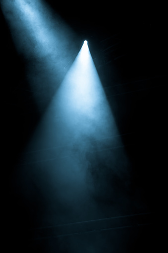 Microphone on stage, stage lights