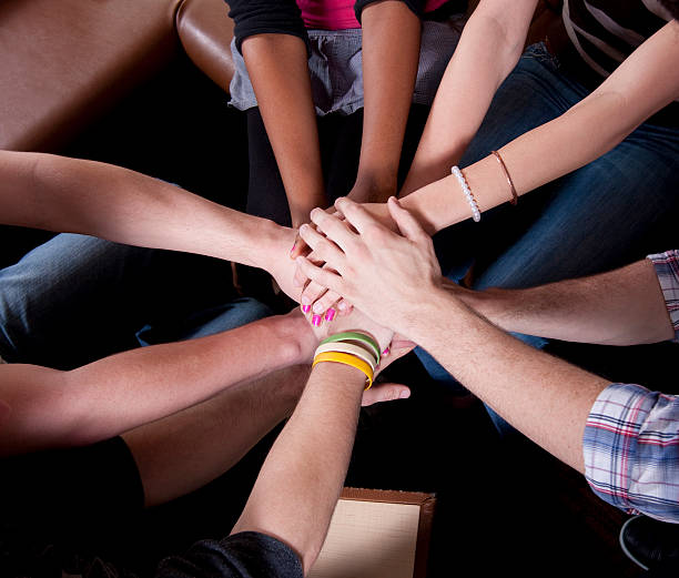 Hands together stock photo