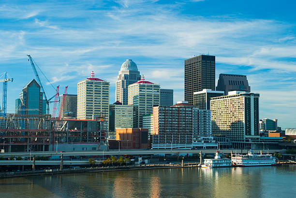 Louisville Downtown elevated skyline view Elevated view / aerial of the Louisville downtown skyline with the Ohio River in the foreground. louisville kentucky stock pictures, royalty-free photos & images