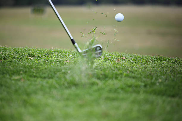 istock Club Hitting Golf Ball in the Air 185074311