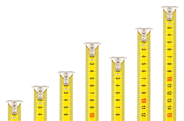 Tape Measures - Rising Graph "Seven tape measures, all differently extended. Can be used as separate graphic elements or as a concept mimicking a rising bar graph. Can be easily rearranged in Photoshop with little knowledge to get a different shape of the slope (declining, etc) or adjusted to a desired length. (Adobe RGB)Declining version also available:" retractable photos stock pictures, royalty-free photos & images