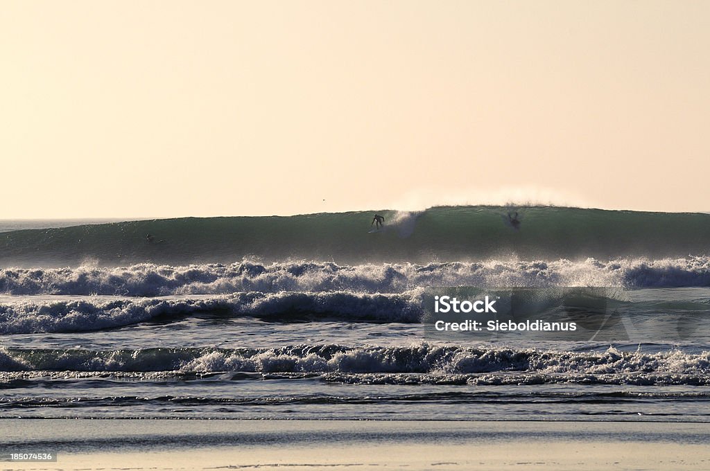 Surfing California, Ocean Beach in Winter. "Surfing California, Ocean Beach in Winter. Huge waves from Japan storm arriving at US Westcoast." Beach Stock Photo