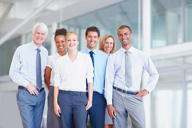 istock Smiling happy business team 185074710
