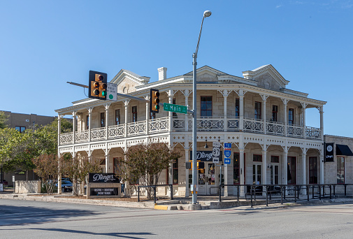 Boerne, USA - November 2, 2023: old vintage buildings in western style and decoration in Boerne, Texas, USA.