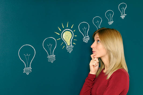 istock Young Woman Thinking A Big Idea 185075703