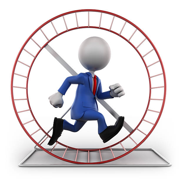 istock Businessman in exercise wheel, isolated with clipping path 185075717