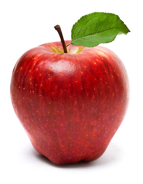 istock ripe red apple with green leaf isolated on white 185075732
