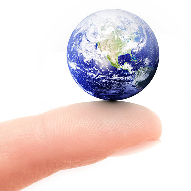 istock Concept of a small earth being balanced on a fingertip 185076118