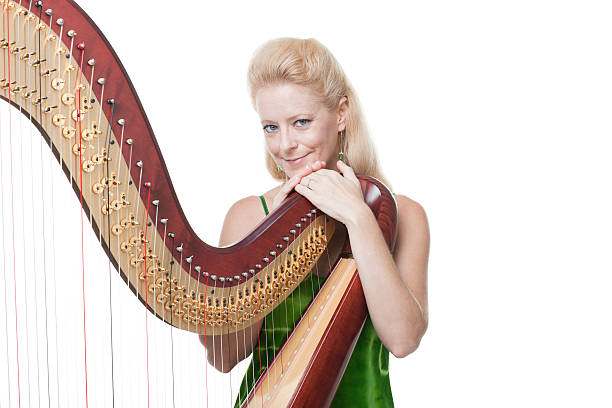 istock Smiling woman with harp 185076710
