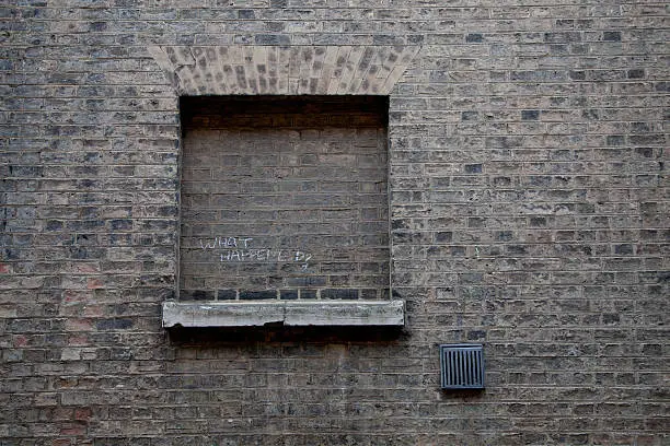 bricked over window in building