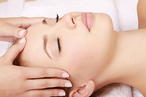 istock Young woman receiving massage. 185077382