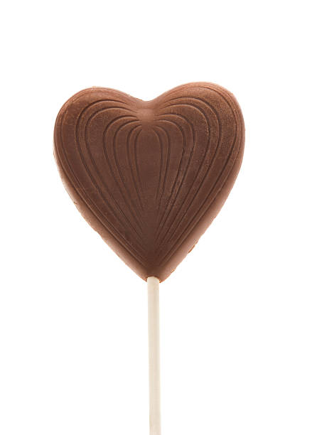 istock Milk chocolate heart on a stick 185077977