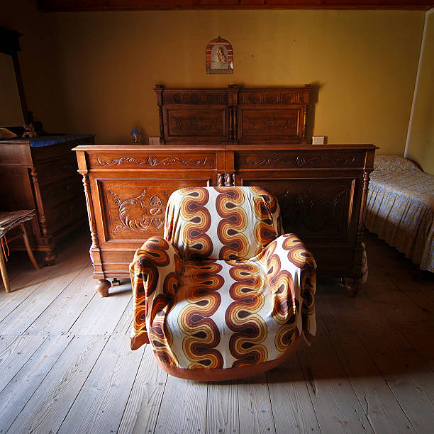 istock Vintage armchair in old house 185078152