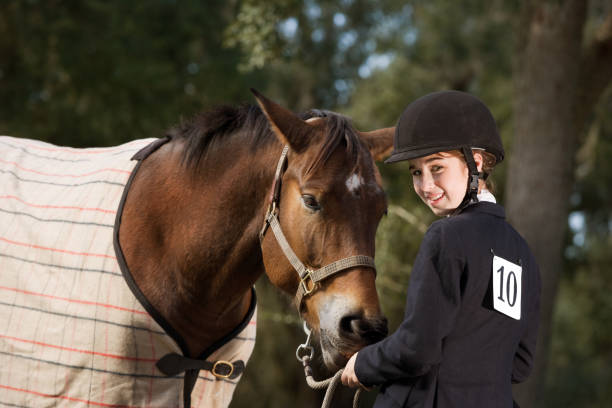 istock Young girl Equestrian with horse 185078326