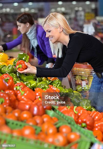 Young Woman Buying Vegetables In Supermarket Stock Photo - Download Image Now - 20-24 Years, Accessibility, Adult