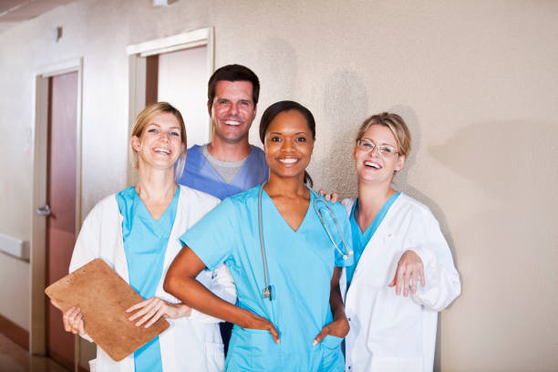 istock Medical workers standing in hospital corridor 185078549