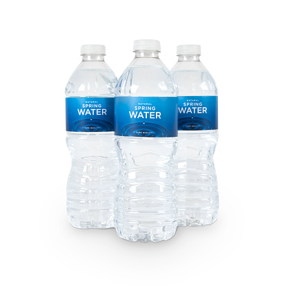 Three bottles of natural spring water with generic (fictitious) labeling. Isolated on white. Contains CLIPPING PATHS for easy editing.