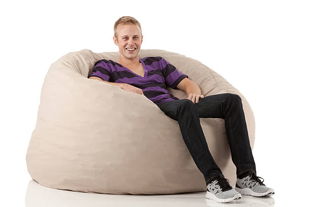istock Happy man resting in a bean bag 185079676