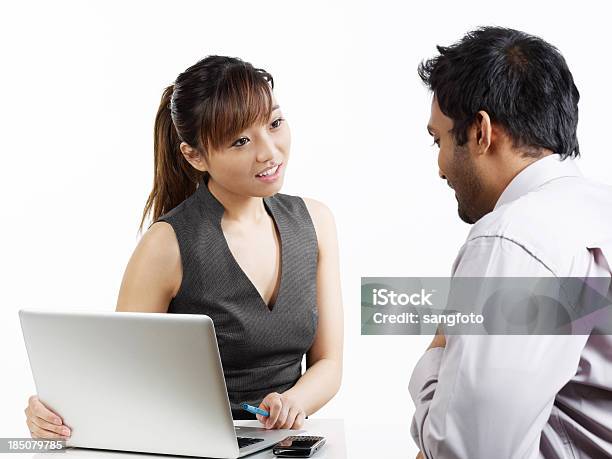 Two Business Colleagues Talking Stock Photo - Download Image Now - 20-29 Years, Adult, Adults Only
