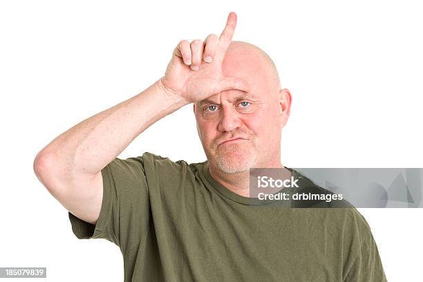 Mature Man Gestures Loser L Hand Sign Stock Photo - Download Image Now - Gesturing, Letter L, 40-49 Years