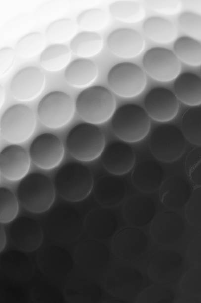 istock Texture of white golf ball exaggerated by side lighting 185080265