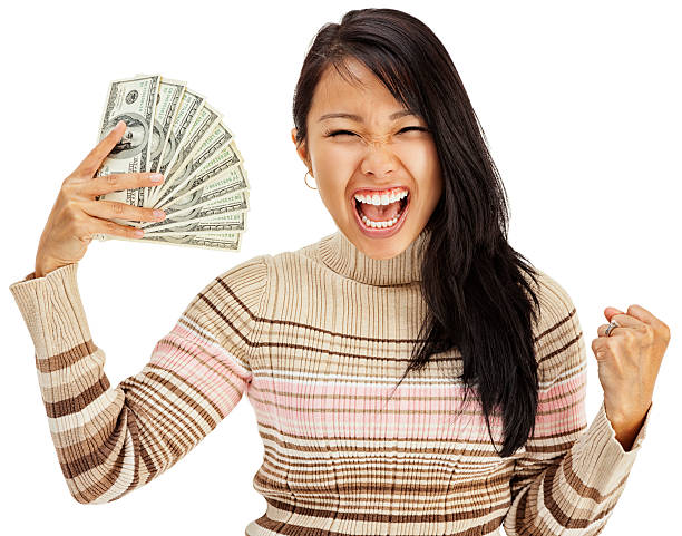 istock Excited Young Woman Holding Money 185080321