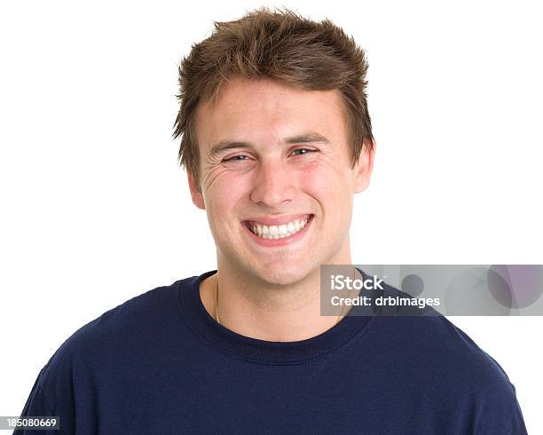 Grinning Young Man Stock Photo - Download Image Now - Smiling, Sneering, Studio Shot