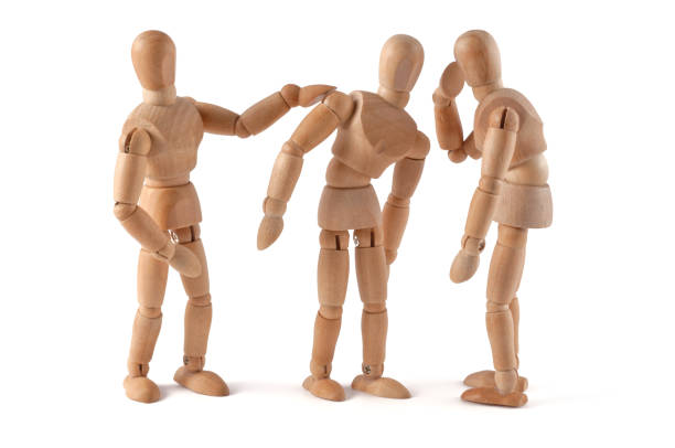 istock Rumors - wooden mannequin wispering 185080911