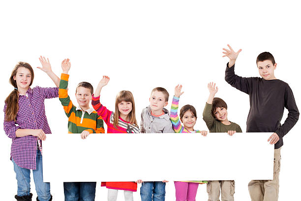istock group of children holding a sign 185081008