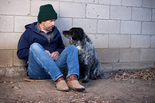 Homeless man with dog.