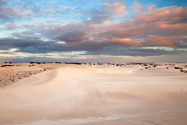 istock White sand dunes near Lancelin, Western Australia at sunset 185081843