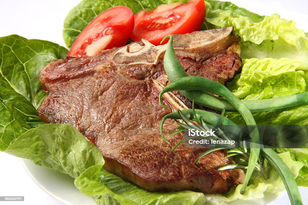 T-bone Steak and  Vegetables Animal Bone Stock Photo