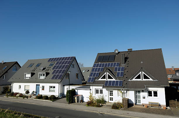 istock Two duplex houses with solar panels on the roof 185082546