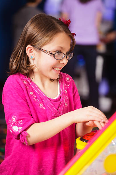 istock Little Girl in an Amusement Arcade 185082930