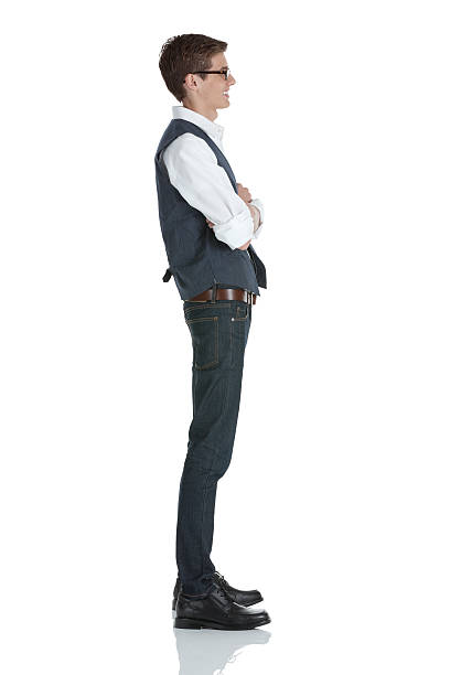 istock Profile of a man standing with his arms crossed 185083452