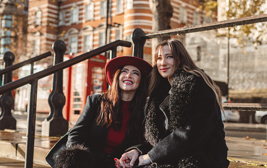 Smiling Happiness Best Friends Posing in the Famous Streets of London, with Southbank, Westminster, Big Ben, and the Parliament Building in the Background.
The backdrop includes iconic landmarks such as Southbank, Westminster, Big Ben, Double decker red bus, Red Telephone Booths, Underground and the Parliament Building, creating a picturesque scene. This vibrant stock photo radiates positive vibes, celebrating the bond of friendship amidst the beauty of London's historic architecture. Perfect for conveying a sense of joy, exploration, and camaraderie, this image is an ideal choice for travel blogs, lifestyle articles, and social media content. Smiling, Best friends, Posing, Famous streets, London, Southbank, Westminster, Big Ben, Parliament Building, Friendship, Positive vibes Joy, Exploration, Camaraderie, Travel blogs, Lifestyle, Social media