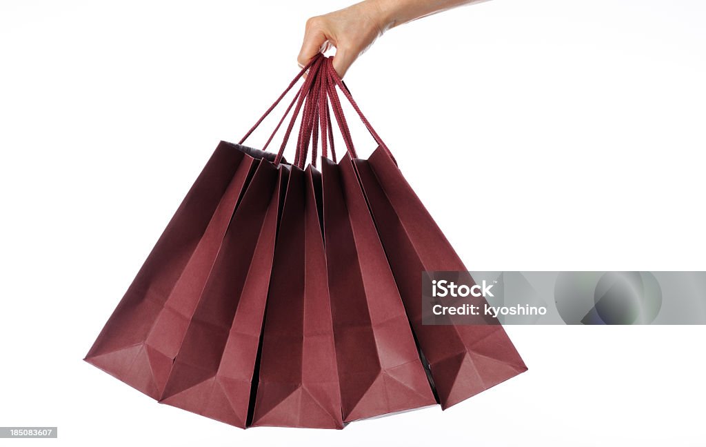 絶縁ショットのハンド用ショッピングバッグ、白背景に - 1人のロイヤリティフリーストックフォト
