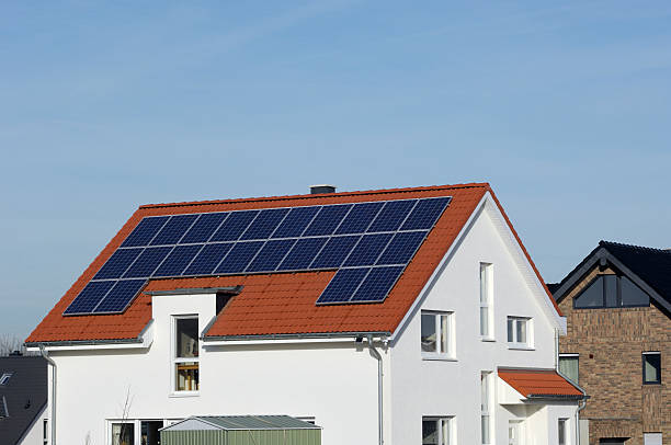 istock White house with solar panels on the roof 185083650