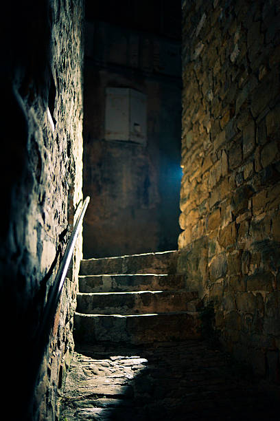 istock Empty narrow Mediterranean street at night 185084818