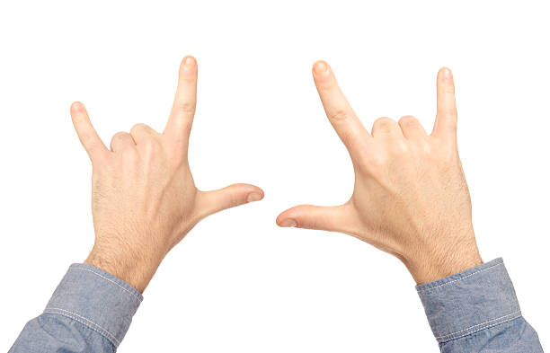 istock Hands raised up for the Rock On gesturing 185084959