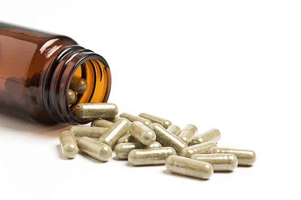 Bottle of herbal medicine in capsule format